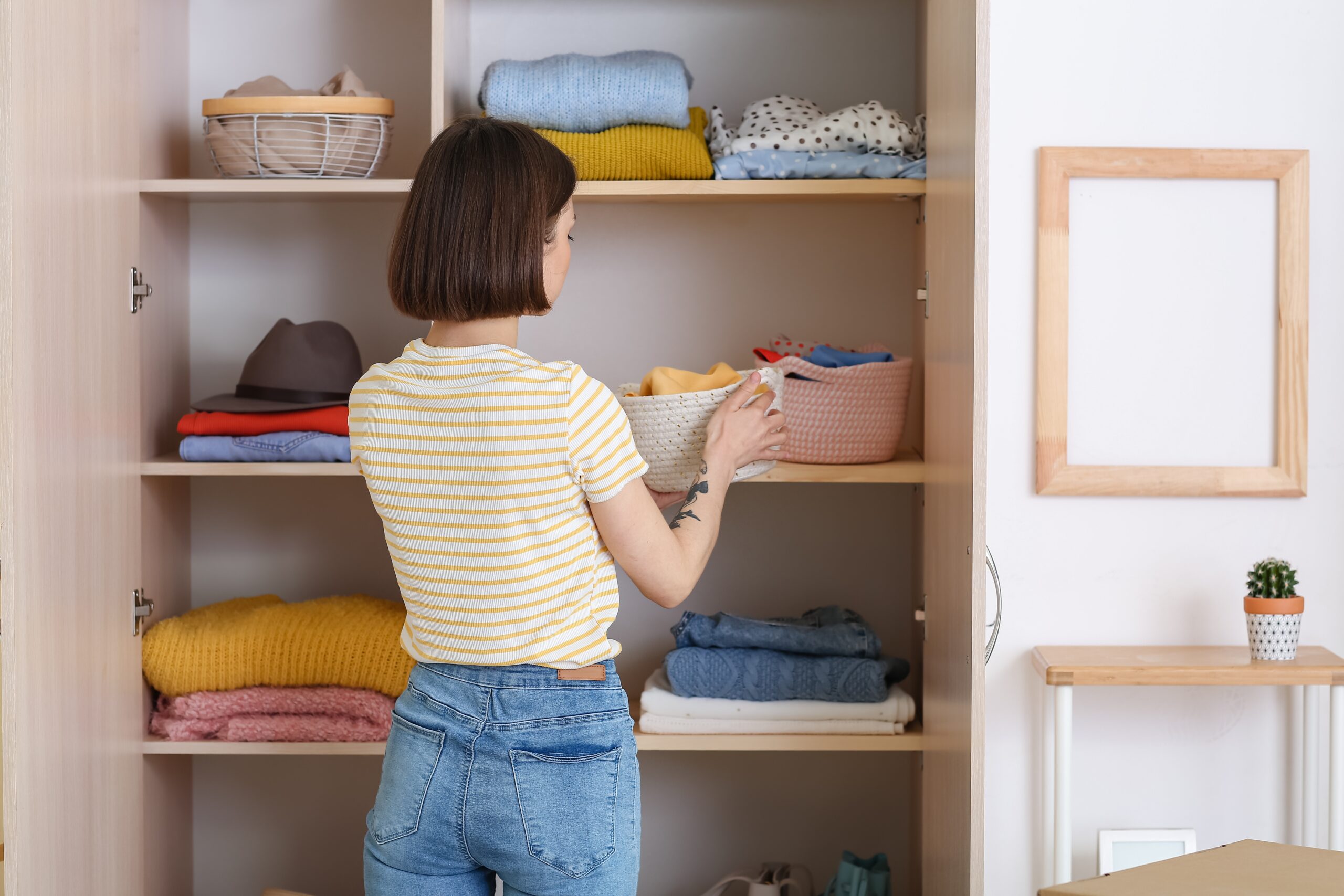 woman organizing closet