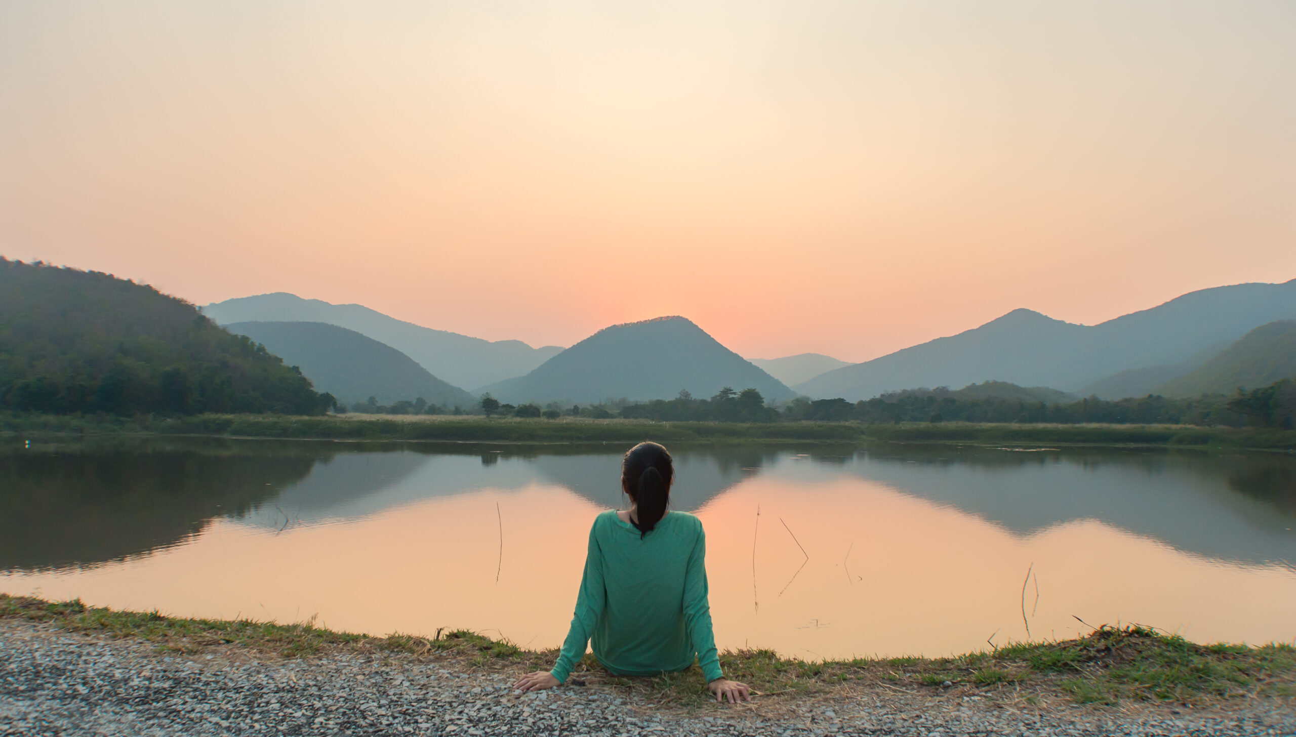 woman watching sunset
